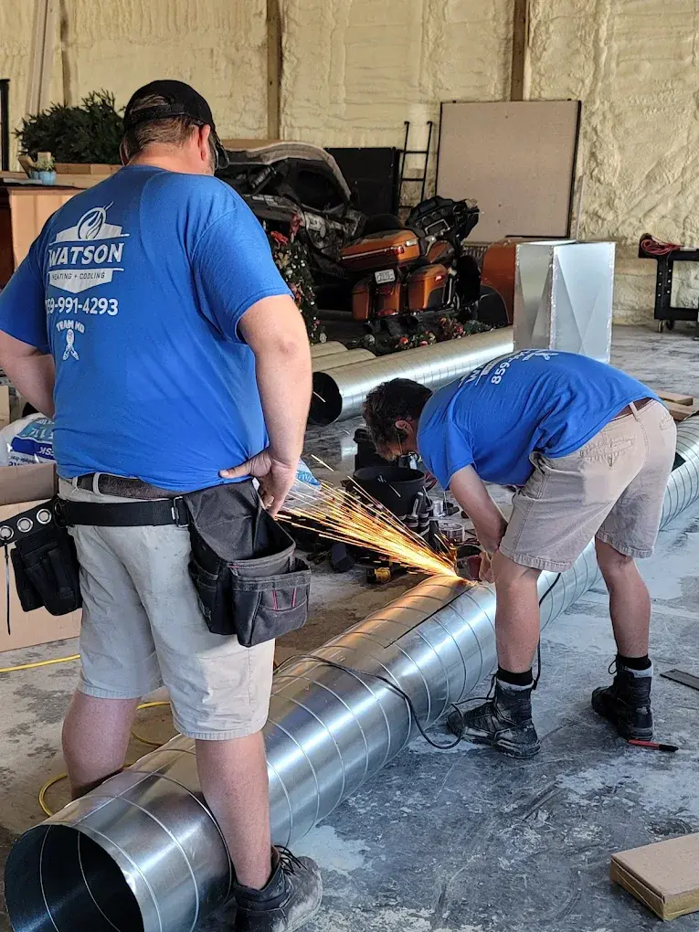 Owner Mike Watson and son Josh working on a ductwork fabrication job together